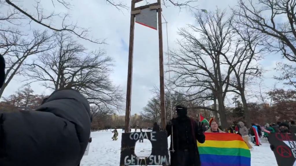 Protesters bring out a guillotine Threatening Trump